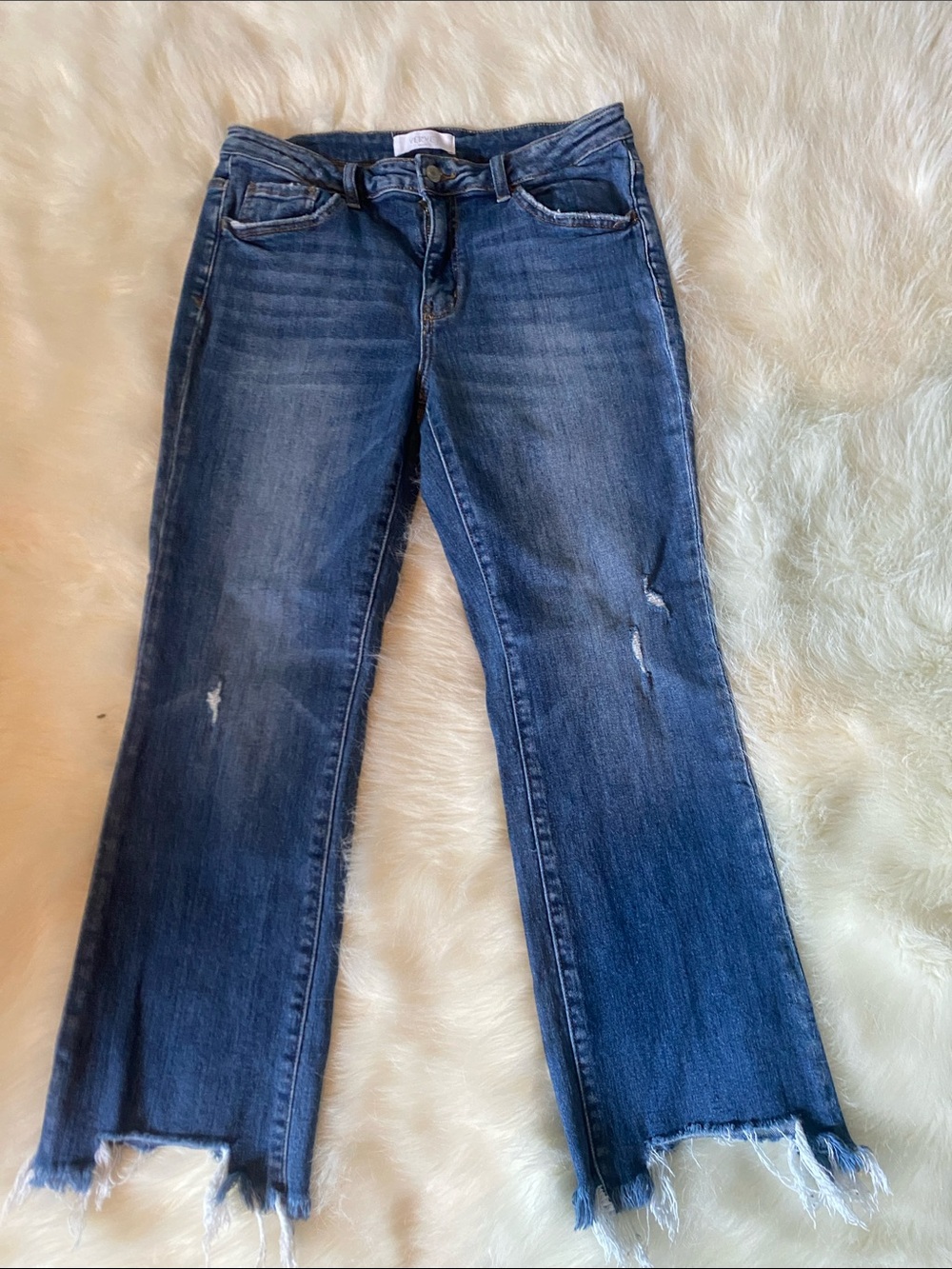 Mid-Blue Distressed Flare Jeans with Frayed Hem